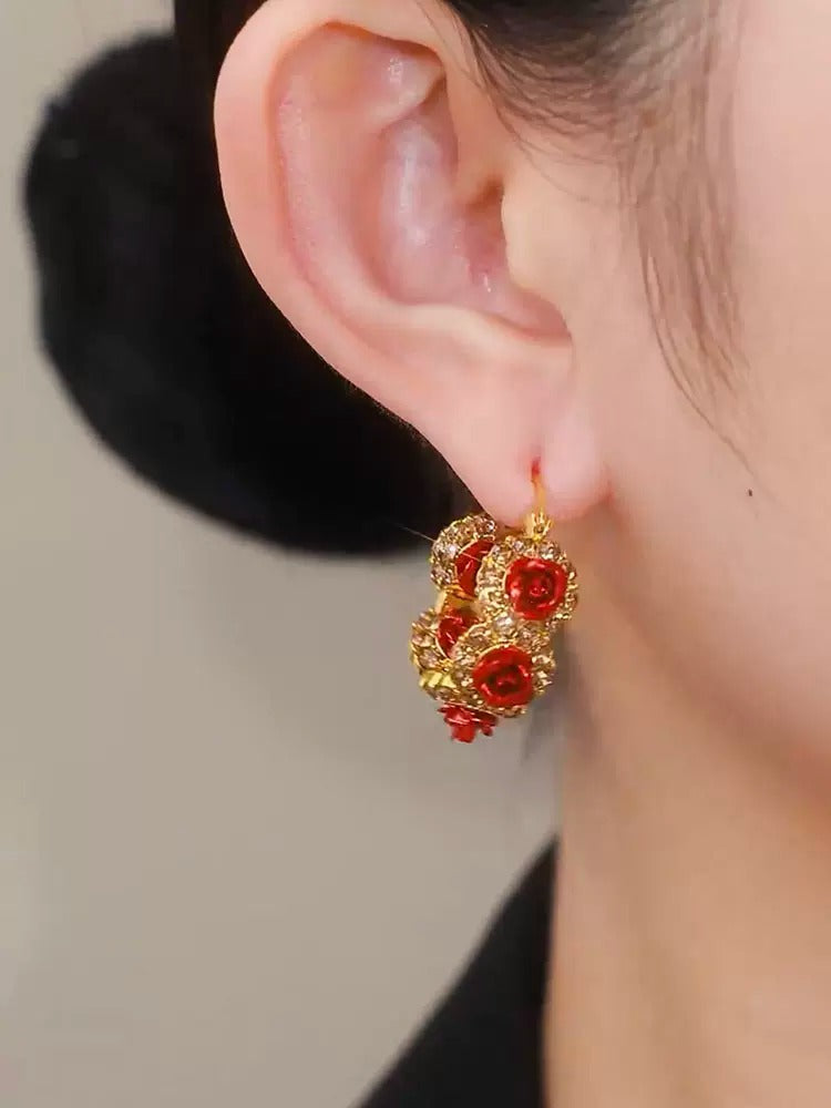Diamond-studded red rose earring